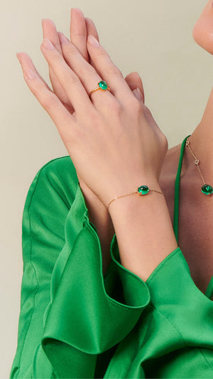 Gold vermeil slidee bracelet and gold ring for women with lab-grown emerald stone from the sugardrop collection
